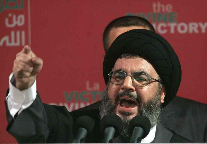 Pemimpin Hizbullah Sayyed Hassan Nasrallah berbicara pada rapat umum 22 September 2006 di Beirut, Lebanon.
