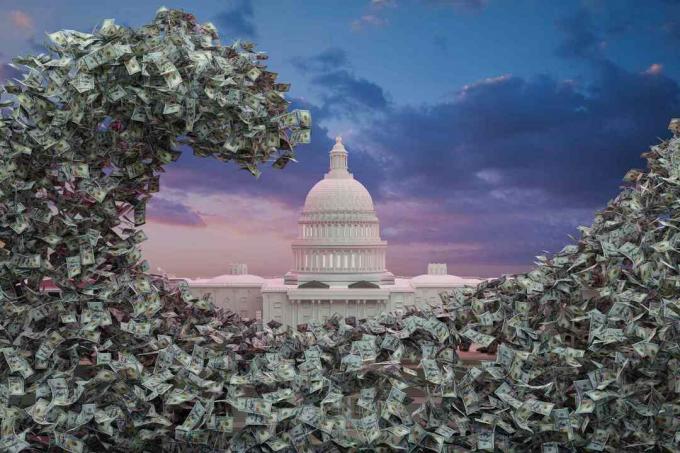 Uang kertas dolar mengalir di sekitar Capitol Amerika Serikat.